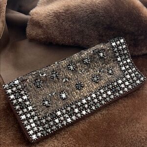 Tory Burch vintage Brown Beaded suede Clutch. Measures 9.5” x 4.5”